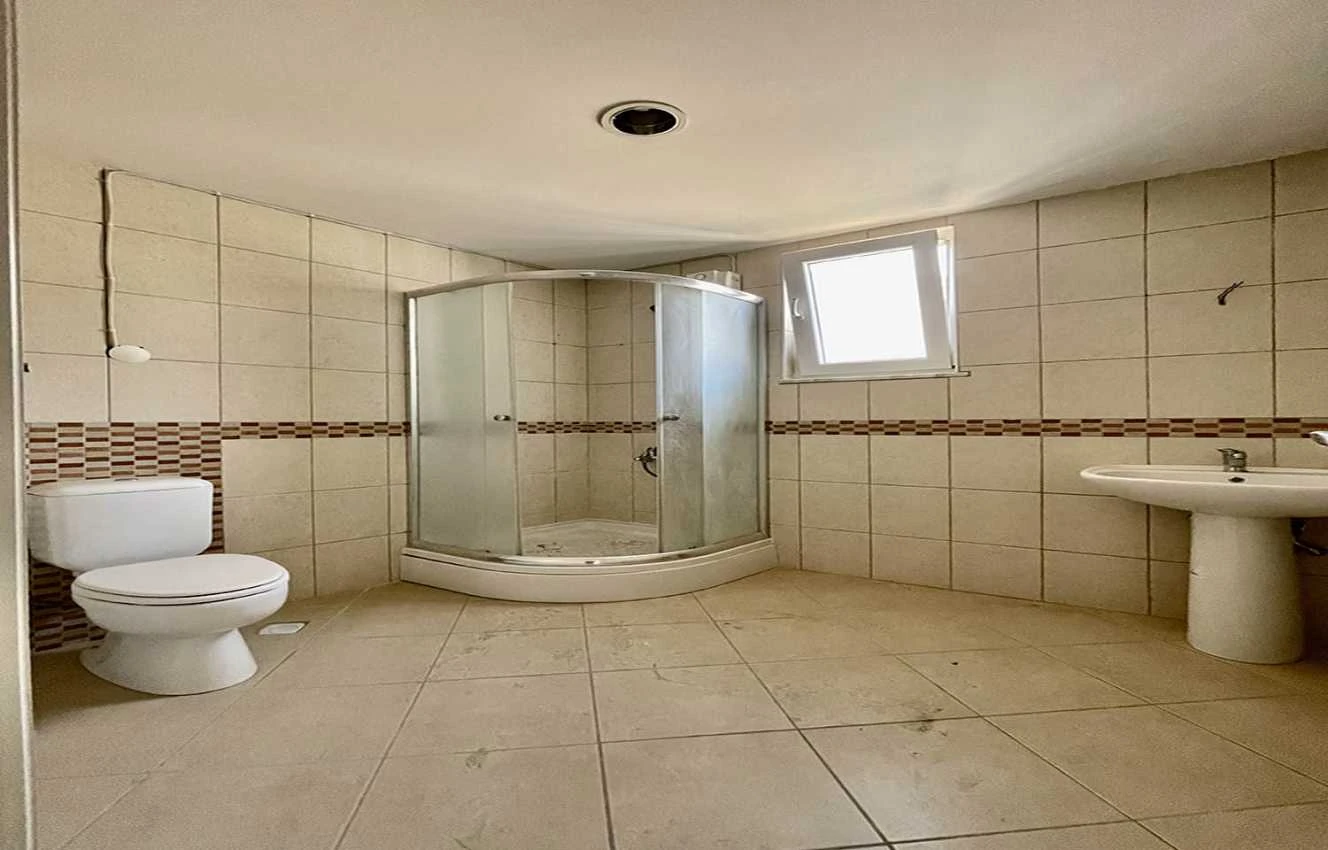 housebind In the center of Alanya apartment 2 + 1 unfurnished