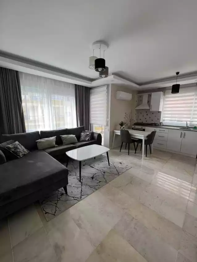 housebind Cozy apartment 1 + 1 with furniture in the resort town of Mahmutlar / Alanya